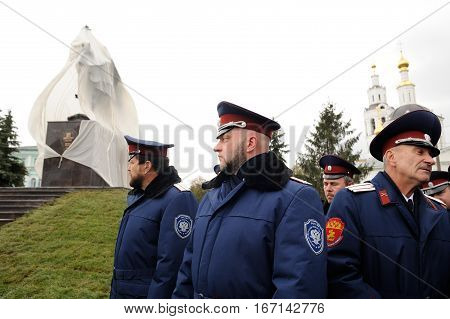 Orel Russia - October 14 2016: Ivan the Terrible monument opening ceremony. People in cossack uniform and Ivan the Terrible monument closeup
