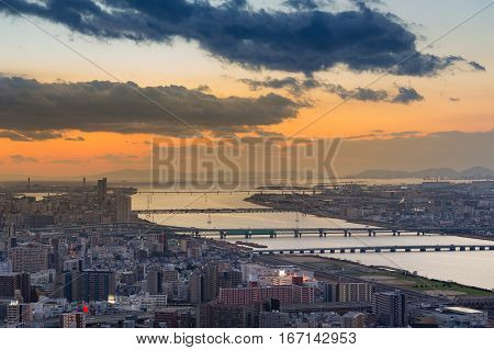 City residence downtown with river crossover during suneset Osaka Japan