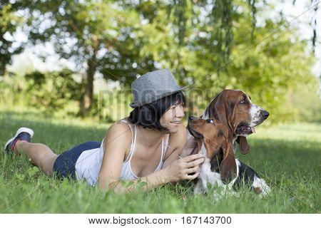 The woman with the dogs in the countryside Selective focus and small depth of field lens flare