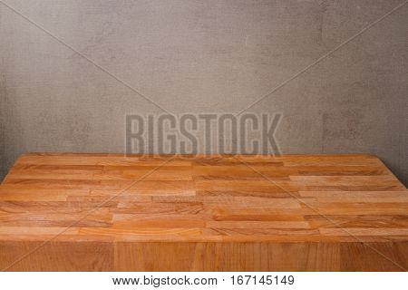 Wooden board over ristic wall background for product montage display