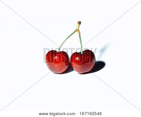 TWO cherries isolated on white background fruits