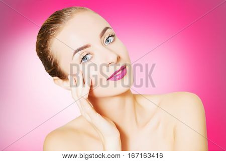 portrait of beautiful smiling woman with perfect skin