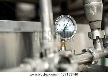View of preassure indicator at milk factory close up shot