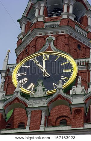 dial mechanical clock on the Spasskaya tower of the Moscow Kremlin close up in summer