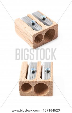 Wooden pencil sharpener isolated over the white background, set of two different foreshortenings