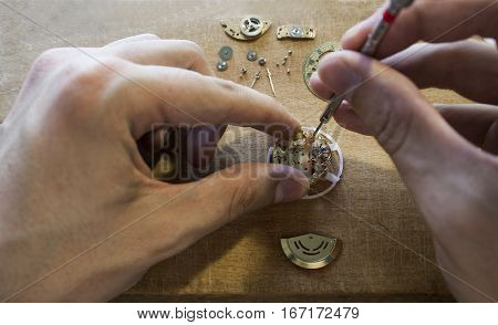 The procces of mechanical watch repair wih special tools