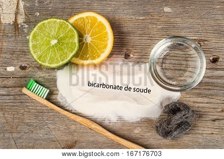 Baking Soda, Water, Lemon, Sponge, Toothbrush And Steel Wool - Bicarbonate De Soude Means Baking Sod