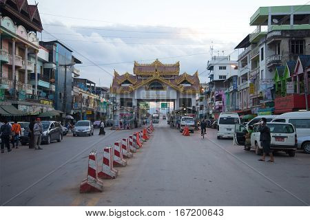 MYAWADI, MYANMAR - DECEMBER 16, 2016: A view of the border checkpoint on birmano-thai border from the burmese town of Myawadi early in the morning