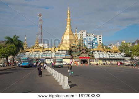 YANGON, MYANMAR - DECEMBER 17, 2016: View of the Sule pagoda in the cloudy morning