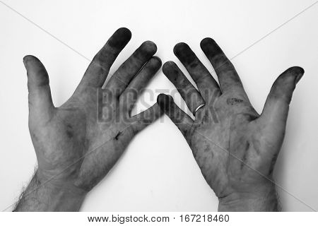 Dirty hands of a man on a white background