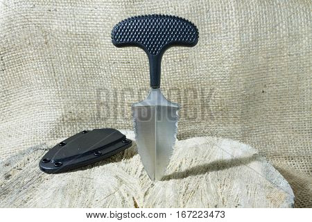 Neck Knife With Case On Stump.
