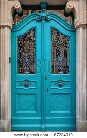 Traditional european vivid facade with entance door