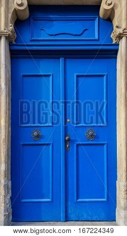 Traditional european vivid facade with entance door