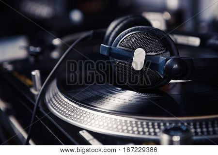 Disc Jockey Headphones On Turntable Vinyl Music Record Player