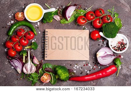 Fresh organic vegetables herbs and spices. Mix salad tomatoes chili garlic on stone background. Healthy food healthy lifestyle and diet concept. Top view