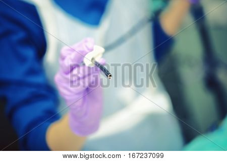 The tip of the bronchoscope glowing. Modern mdeicine