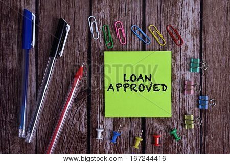 Tolls With Notes LOAN APPROVED Conceptual On Wooden Background