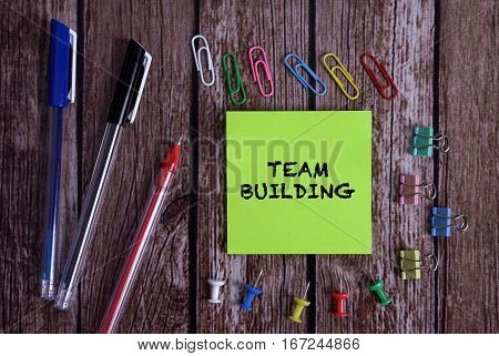 Tolls With Notes TEAM BUILDING Conceptual On Wooden Background