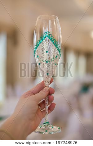 Wedding champagne glass in hand hand painted. Wedding concept