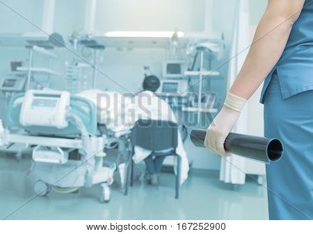 Female doctor brought the test results to a patient.