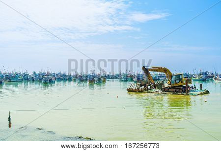 Excavator In Port