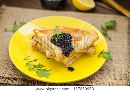 Black Caviar On Russian Pancakes - Blini. Selective Focus.