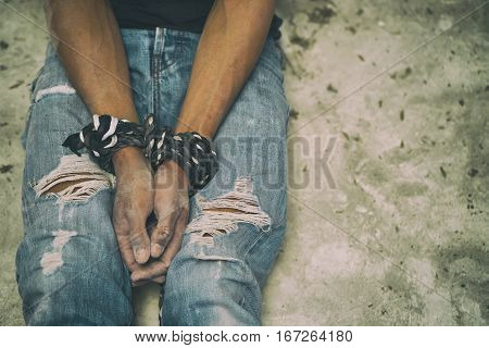 Hopeless Man Hands Tied Together With Rope