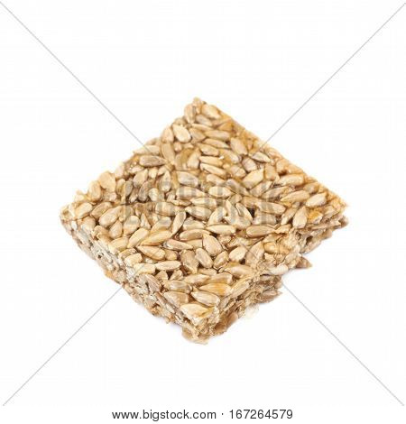 Single piece of a gozinaki confection sweets isolated over the white background