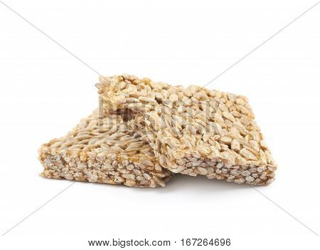 Two pieces of gozinaki confection sweets isolated over the white background
