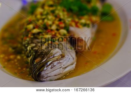 steamed fish Chinese style steamed fish in spicy sauce