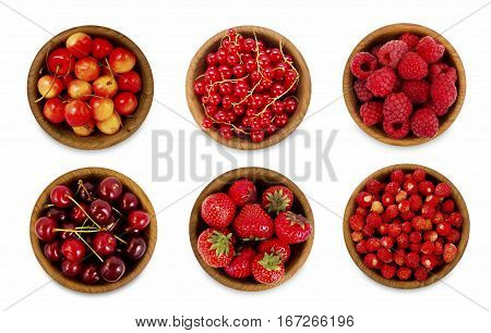 Collection from various red berries. Strawberries red currants cherries raspberries. Collage of different red fruits and berries isolated on white. Ripe and tasty berry. Top view.