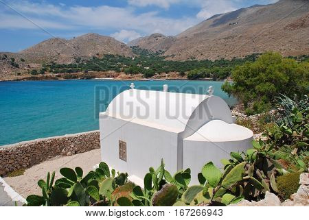 A small chapel above Pondamos beach at Emborio on the Greek island of Halki.