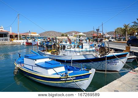 ELOUNDA, CRETE - SEPTEMBER 17, 2016 - Traditional fishing boats in the harbour Elounda Crete Greece Europe, September 17, 2016.