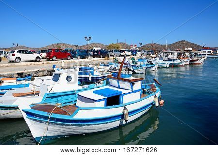 ELOUNDA, CRETE - SEPTEMBER 17, 2016 - Traditional fishing boats in the harbour Elounda Crete Greece Europe, September 17, 2016.