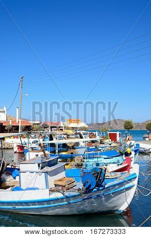 ELOUNDA, CRETE - SEPTEMBER 17, 2016 - Traditional fishing boats in the harbour Elounda Crete Greece Europe, September 17, 2016.