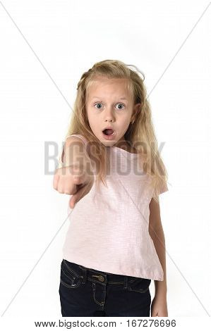 portrait of cute and sweet little girl in disbelief and surprise face expression looking amazed in schock with mouth opened isolated on white background