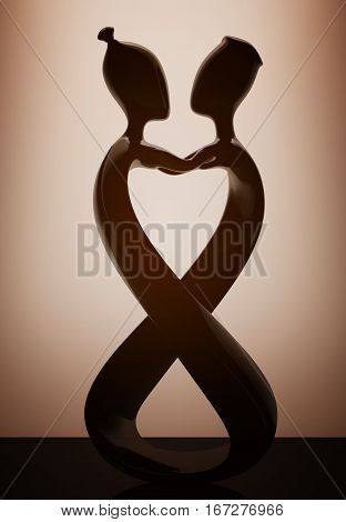 Abstract Wooden Man and Wooman in Love Statue with backlight over Wall in dark room. 3d Rendering