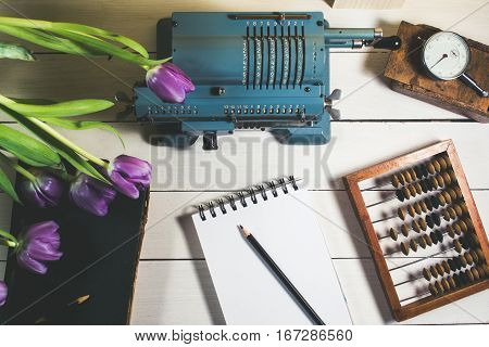 Old Calculating Machine On A Wooden Table