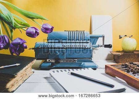 Old Calculating Machine On A Wooden Table