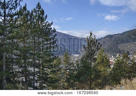 Residential district of bulgarian houses in winter village Pasarel with Hydro-Electric power station, Bulgaria