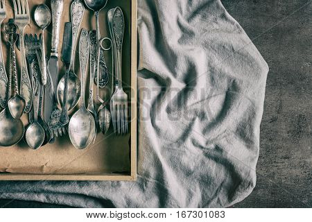 Set of silverware in wooden box