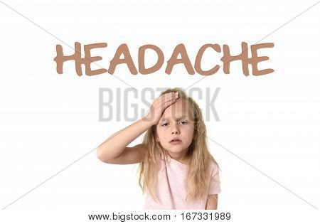 learning English language vocabulary school card with the word headache and sweet cute little female child touching her head suffering stress looking tired and sad isolated on white background