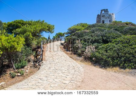 Italy Sardinia Torre di Chia way from tower in sun day