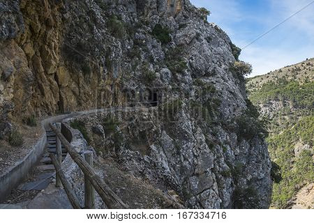 A hiking path following an old, manmade, watercourse to an hidroelectric power station.