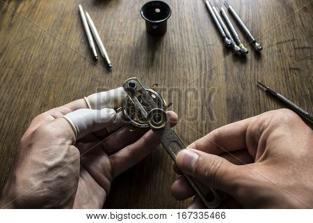 The procces of watch repair with the special tools