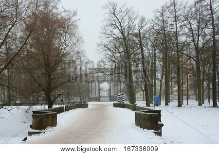 The fog the thaw and Orlov gate in the Catherine Park in Tsarskoye Selo