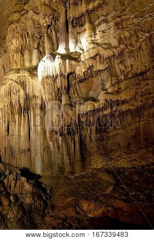 Stone sinters on the cave wall Kinderlinskaya. Russia Ural.