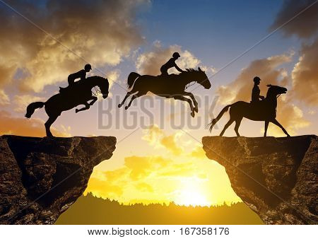 Silhouette of a rider on a horse jumping through the gap between rock at sunset.