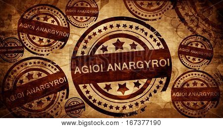 Agioi anargyroi, vintage stamp on paper background