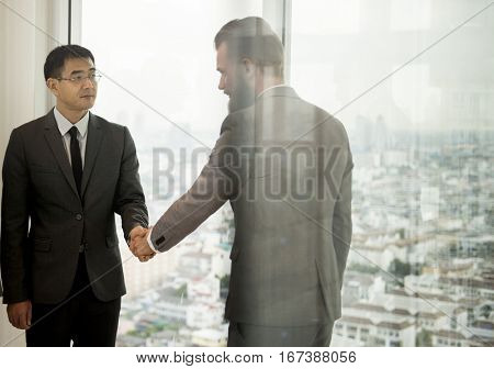 Business Partners Introductionary Handshake Bow